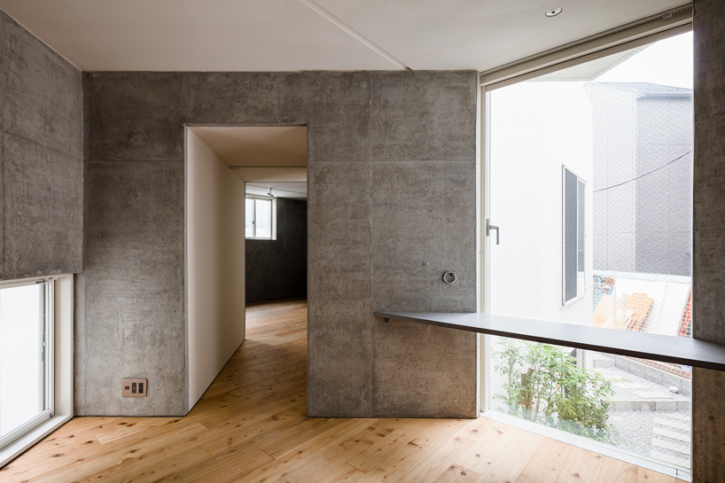 hiroyuki ito architects design sun-filled uehara apartments in tokyo