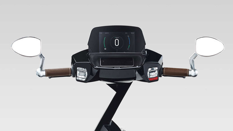 the fully foldable UJET electric scooter has a removable bluetooth speaker