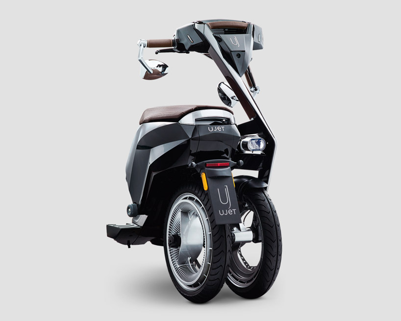 the fully foldable UJET electric scooter has a removable bluetooth speaker