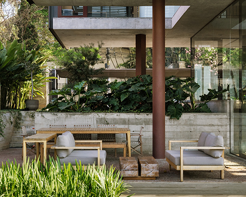 una arquitetos' villa lobos overlooks são paulo and is surrounded by gardens