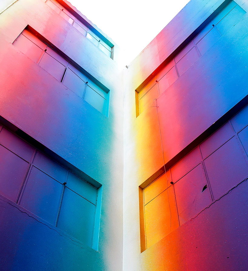 this building in lima is bathed in a spectrum of colorful hues