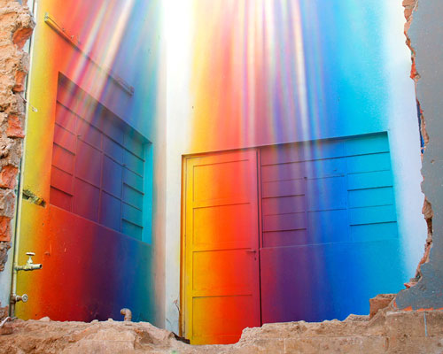 this building in lima is bathed in a spectrum of colorful hues