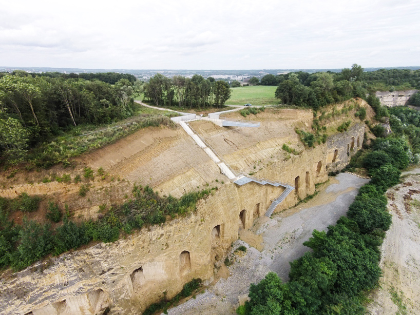 dutch sandstone quarry begins transformation with scenic staircase route
