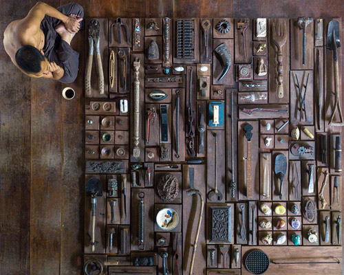 a21studio turns waste into doorknobs for an exhibition in saigon