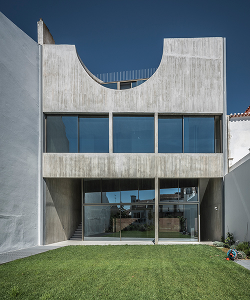 'house in estrela' by aires mateus features a parabolic concrete roof