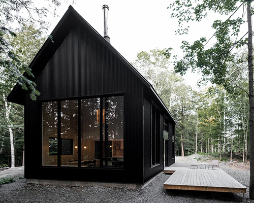 two steel black cabins form striking quebec chalet by appareil architecture