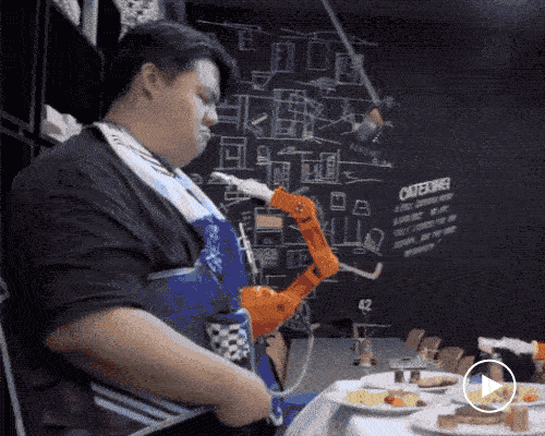 this chest-mounted robot feeds your face so you don't have to