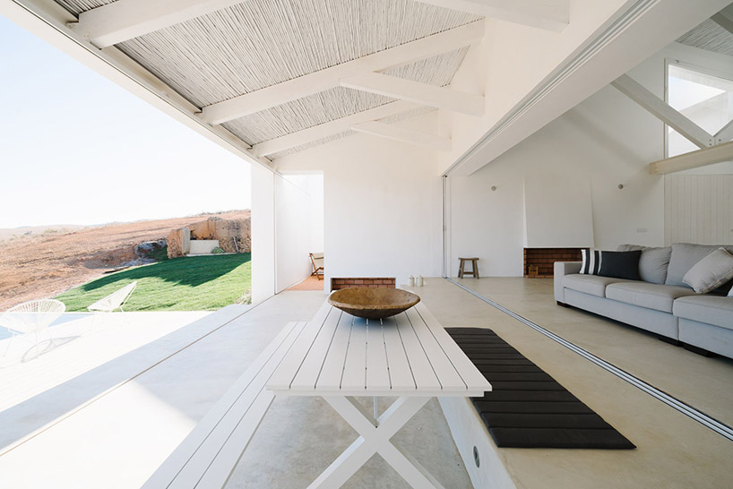 atelier data embeds cercal house in a portuguese slope designboom