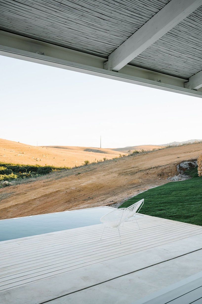 atelier data embeds cercal house in a portuguese slope designboom