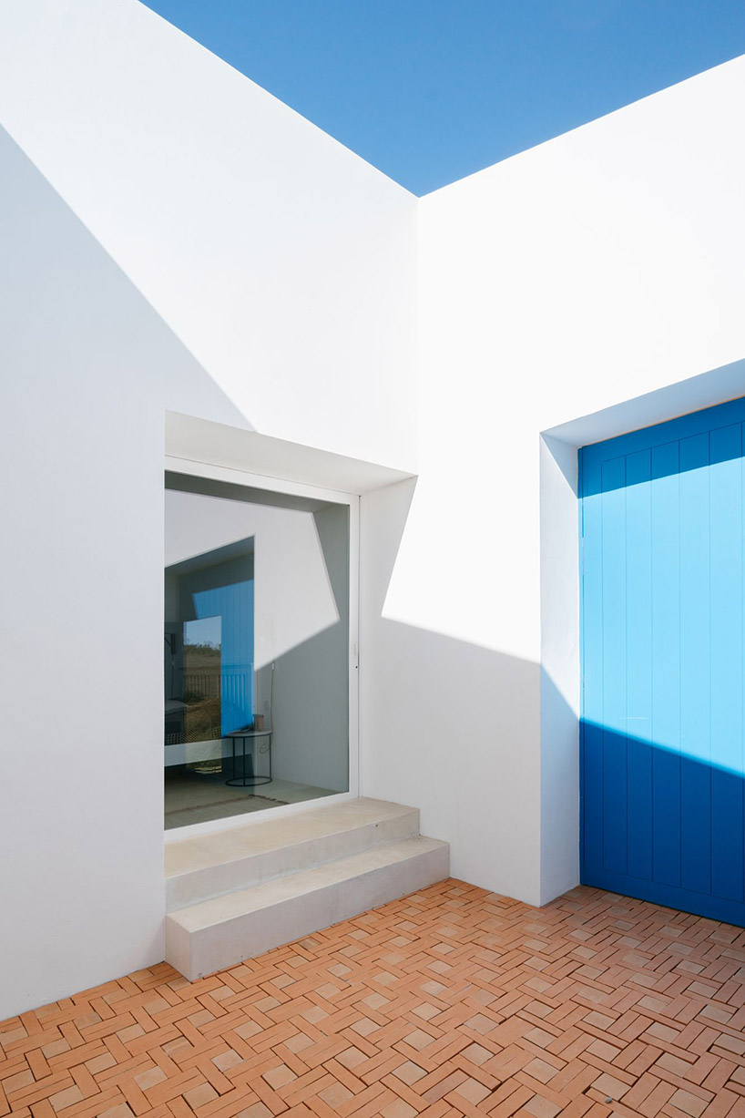 atelier data embeds cercal house in a portuguese slope designboom