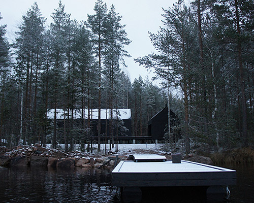 carla gertz embeds mökki santara cabin into the finnish wilderness
