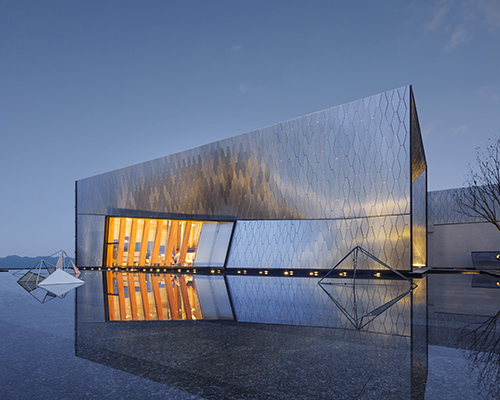 'digital' skin clads undulating timber structure in china's yuanlu community center