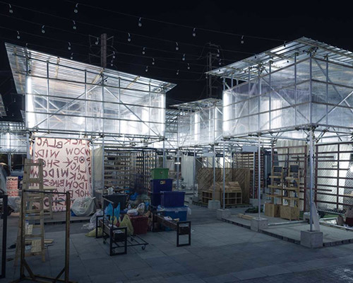 dadad market in thailand features floating structures of light in the night-time cityscape