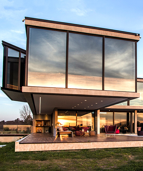 g2 estudio's dragonfly house is built with all-glass facades for 360º views over buenos aires