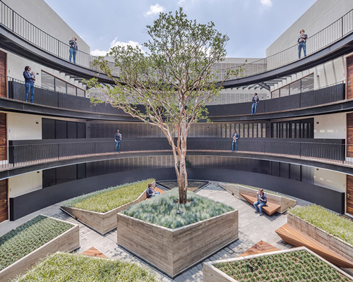 HGR arquitectos designs building with circular courtyard as new housing alternative