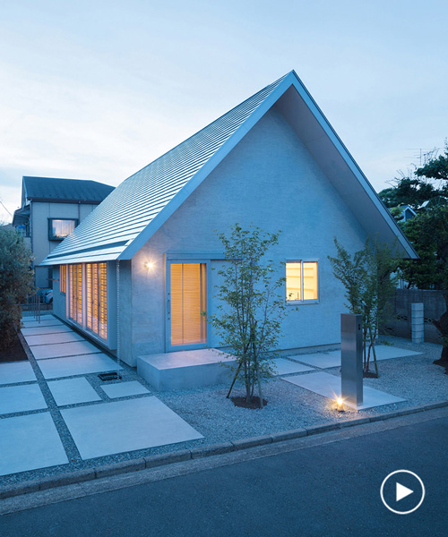mio tachibana architects completes 'hinge' house with a gable roof & paulownia wood