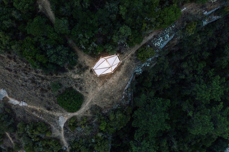 a home is not a hole didier faustino installs glowing monument to