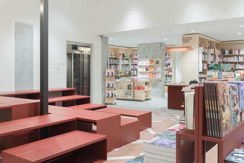 studio briand & berthereau combines terracotta, raw concrete + wood in parisian bookstore