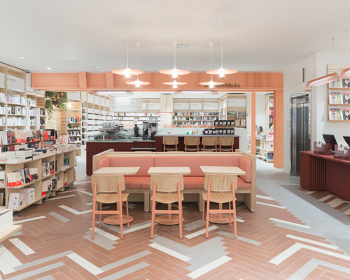 studio briand & berthereau combines terracotta, raw concrete + wood in parisian bookstore