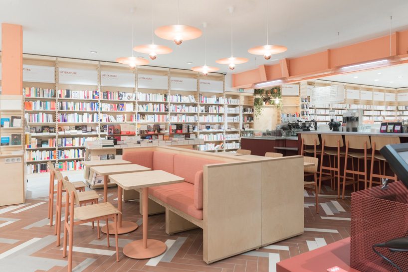studio briand & berthereau combines terracotta, raw concrete + wood in parisian bookstore