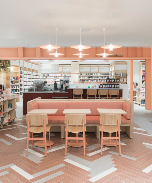 studio briand & berthereau combines terracotta, raw concrete + wood in parisian bookstore