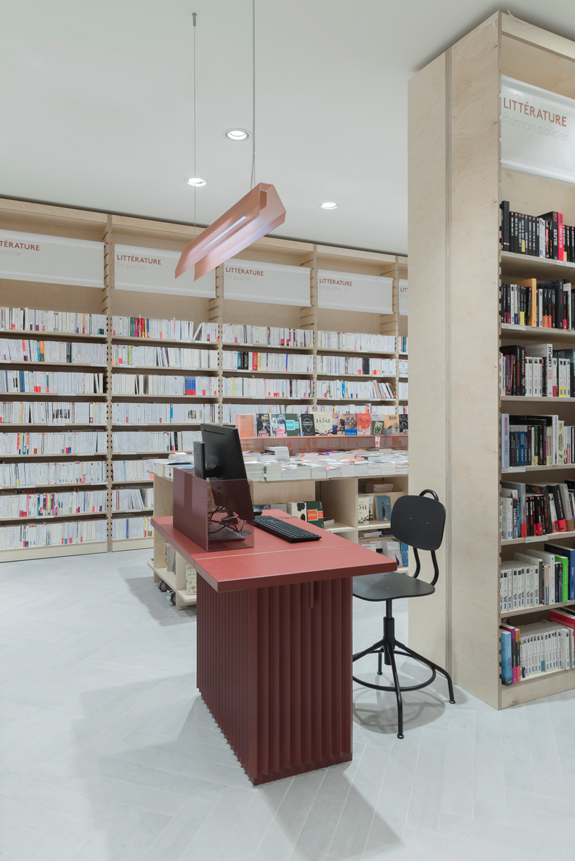 studio briand & berthereau combines terracotta, raw concrete + wood in parisian bookstore