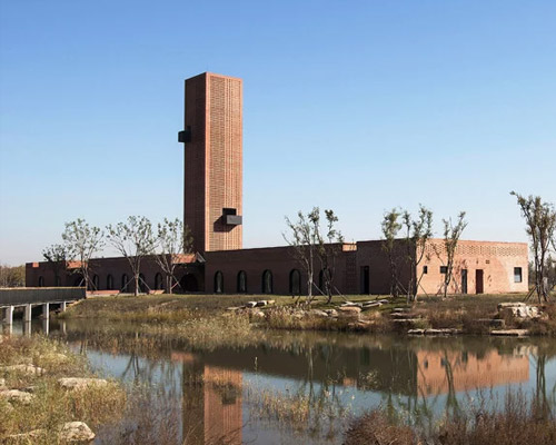 interval architects creates a botanic art center from a disused brick kiln in china