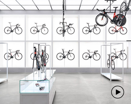 this showroom in lynge by johannes torpe is an airy and transparent chapel for bikes