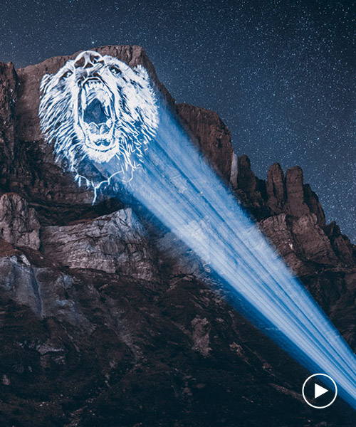 julien nonnon raises awareness by projecting endangered animals onto alpine mountains