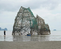 map office remove nets from coral reef to create 6 m high 'ghost island' in thailand
