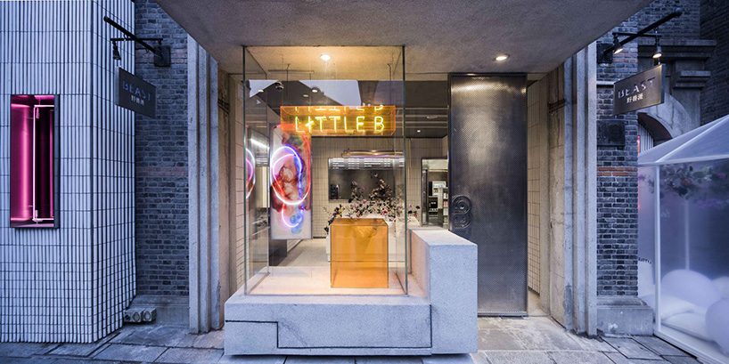 neri & hu incorporates reflective stainless steel and neon in shanghai's little B concept store