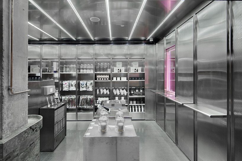 neri & hu incorporates reflective stainless steel and neon in shanghai's little B concept store