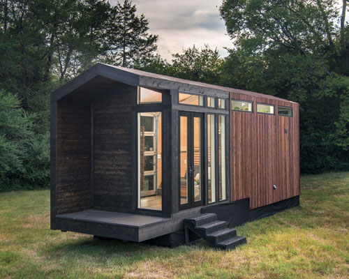 the tiny orchid home is a compact cabin and contemporary take on a farmhouse