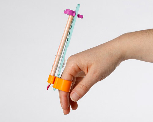 writing aid and bike by openDot help disabled kids enjoy their childhood