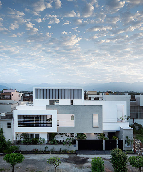renesa's house in india creates a collage of massive geometric forms