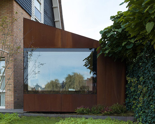 serge schoemaker covers garden studio with 2000 handpainted shingles