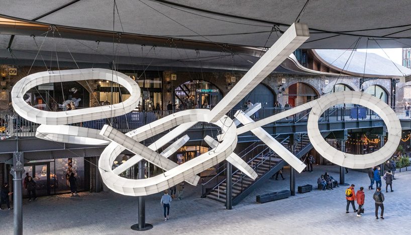 studio mieke meijer decks london's coal drops yard with giant sculptural lights