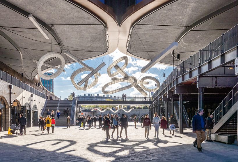 studio mieke meijer decks london's coal drops yard with giant sculptural lights