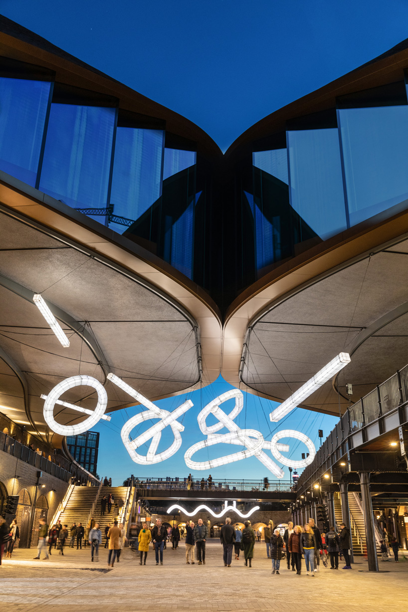 studio mieke meijer decks london's coal drops yard with giant sculptural lights