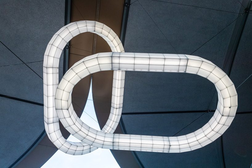 studio mieke meijer decks london's coal drops yard with giant sculptural lights