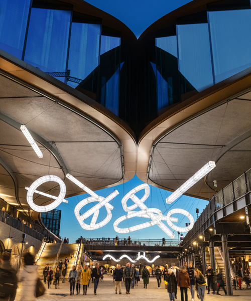 studio mieke meijer decks london's coal drops yard with giant sculptural lights