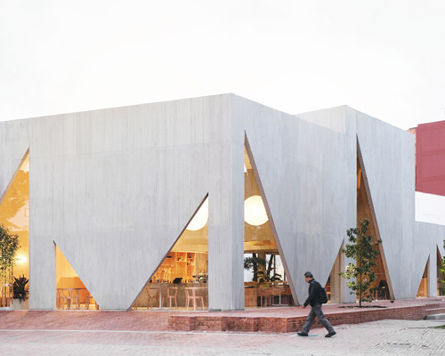 studio cadena completes masa restaurant in bogotá with triangular cutout windows