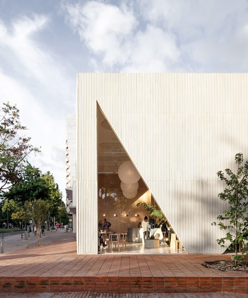 studio cadena completes masa restaurant in bogotá with triangular cutout windows