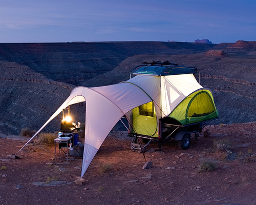 pop-up travel trailer hauls all your gear before expanding to sleep four people