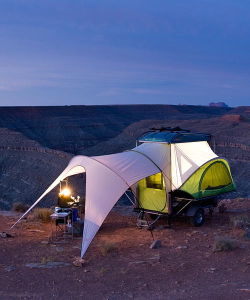 pop-up travel trailer hauls all your gear before expanding to sleep four people
