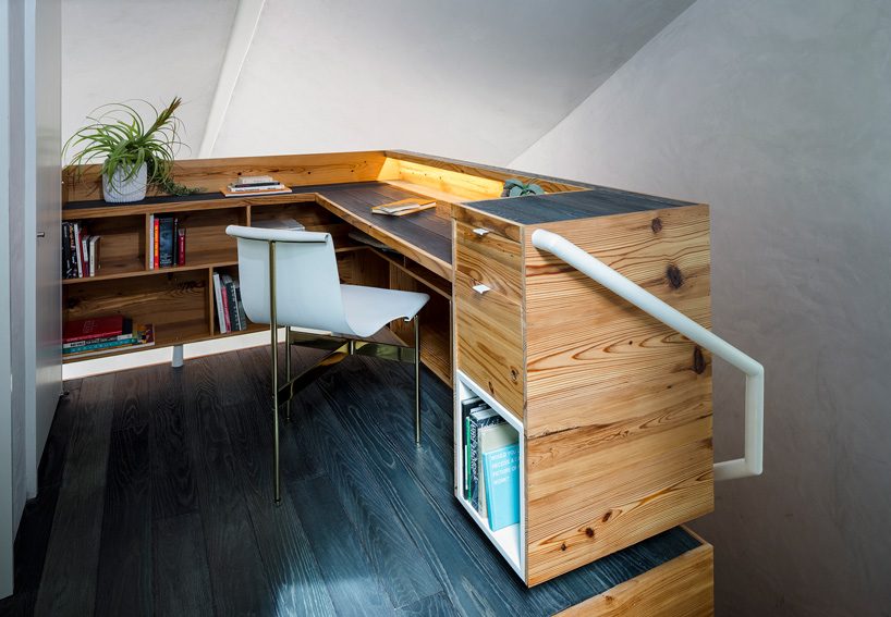 studio 512 clads the angled walls of this texas guesthouse in reclaimed cedar shakes