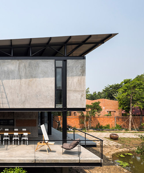 truong an architecture designs modern stilt house for artist in saigon, vietnam