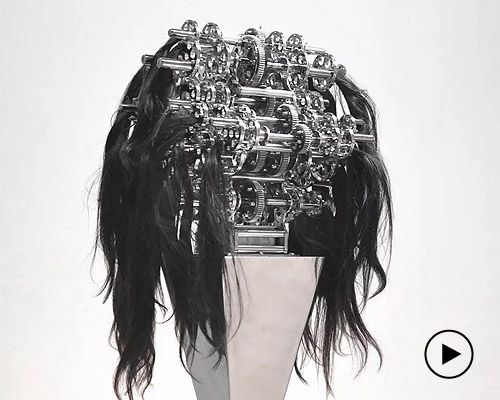 kinetic machine with hair caught in it explores the chaos and anxiety of our reality
