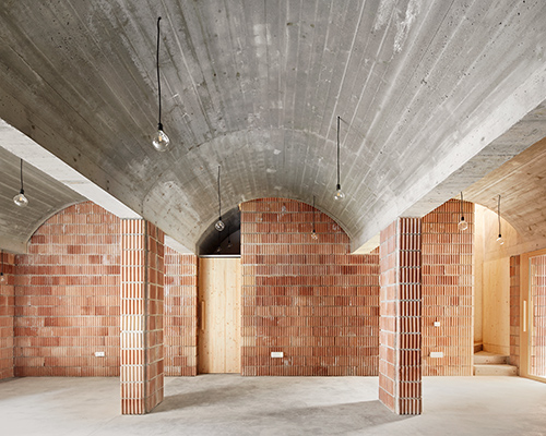 aulets arquitectes' vaulted brickwork reflects the historic architecture of mallorca