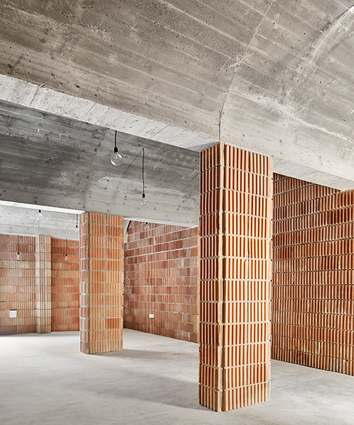 aulets arquitectes' vaulted brickwork reflects the historic architecture of mallorca
